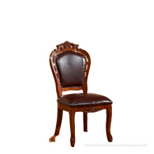 Leather seat carved traditional dining chair